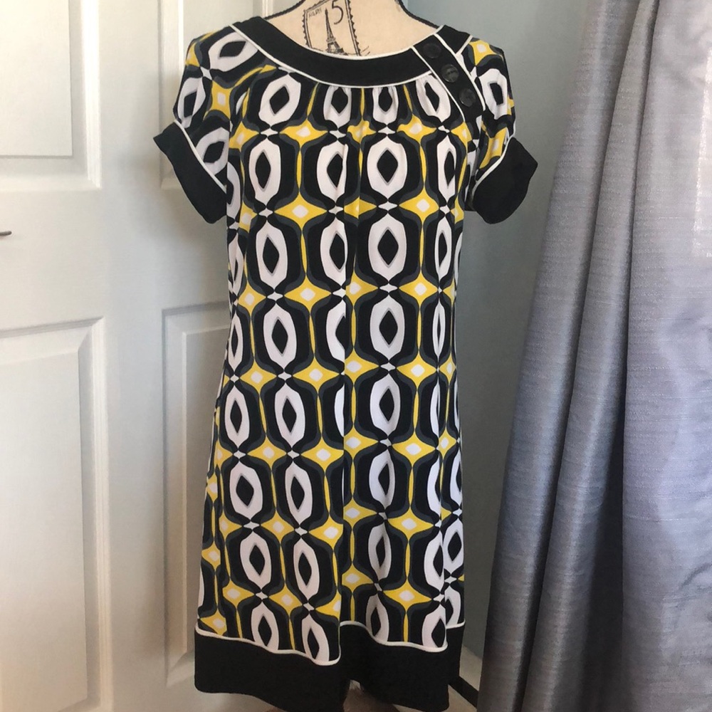 Adorable dress with decorative buttons
